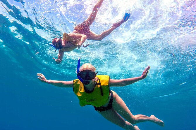ATV Mud Kicking and Snorkeling by Boat in Cozumel - Lunch and a beach-club break