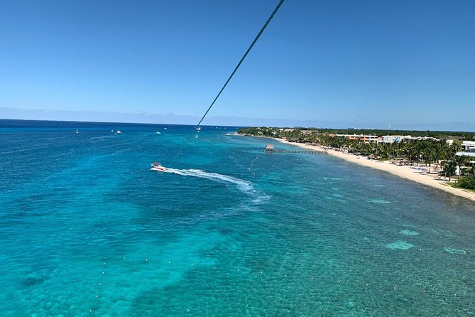 Best Parasailing Cozumel + Locker - The crew, safety gear and group size