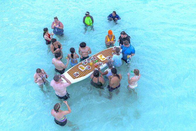 Catamaran Snorkel Adventure to El Cielo and The Money Bar Beach - El Cielo: shallow water, starfish, and a snack break