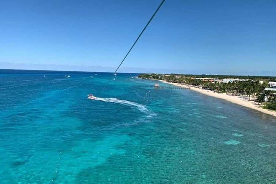 Cozumel: Best Parasailing Experience + Locker - Getting ready with harness and life jacket